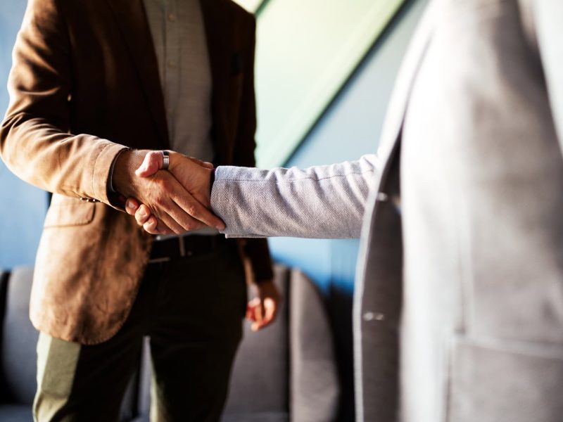 Business handshake and business people concept. Partnership, deal, agreement